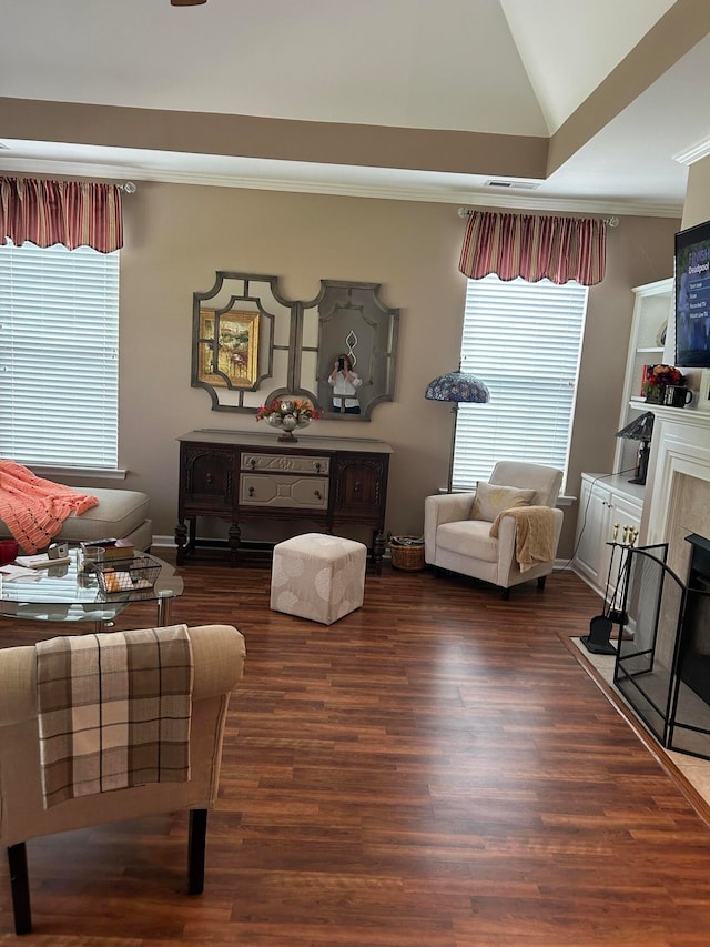 living room with vaulted ceiling and dark hardwood / wood-style floors