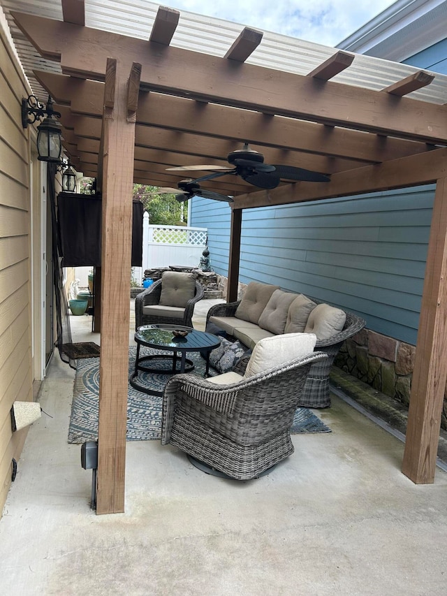 view of patio with an outdoor living space, a pergola, and ceiling fan