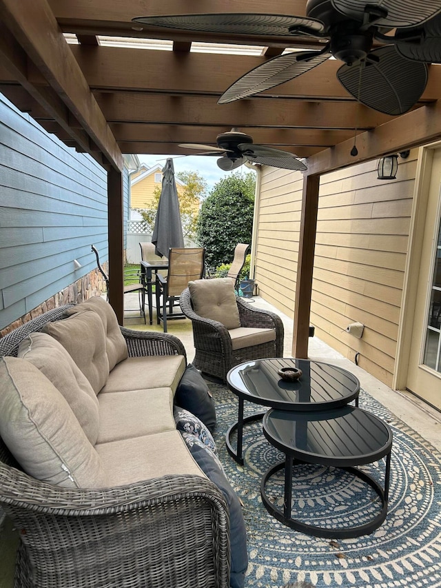 view of patio featuring an outdoor living space and ceiling fan