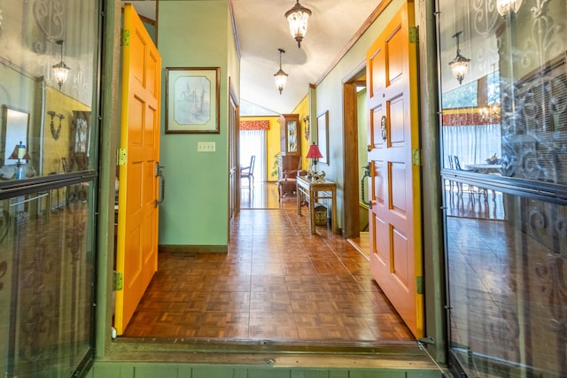 hallway with vaulted ceiling