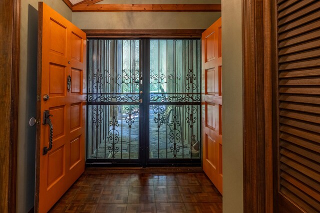 interior space with dark parquet floors