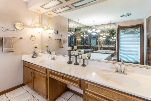 bathroom with vanity and tile patterned flooring