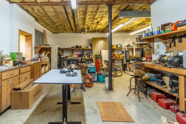 basement with a workshop area