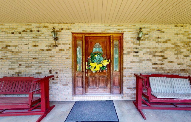 property entrance with covered porch