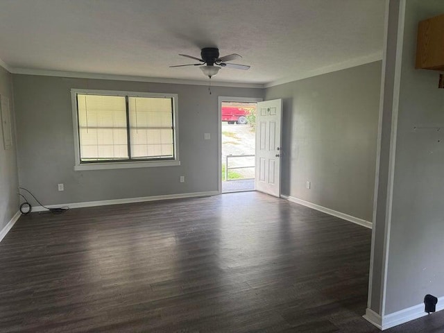 unfurnished room featuring crown molding, ceiling fan, and dark hardwood / wood-style floors