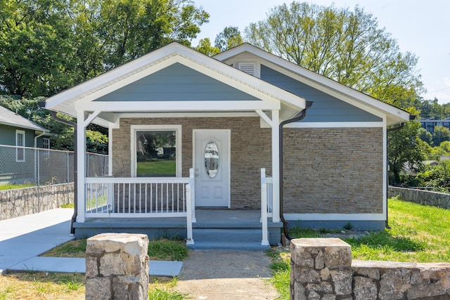 bungalow-style home with a porch