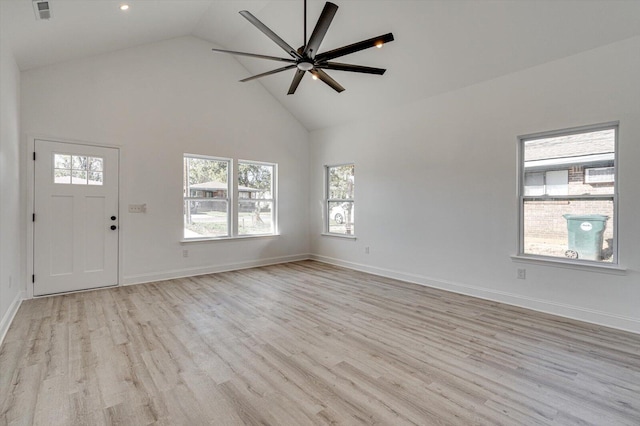 interior space with ceiling fan, high vaulted ceiling, and light wood-type flooring