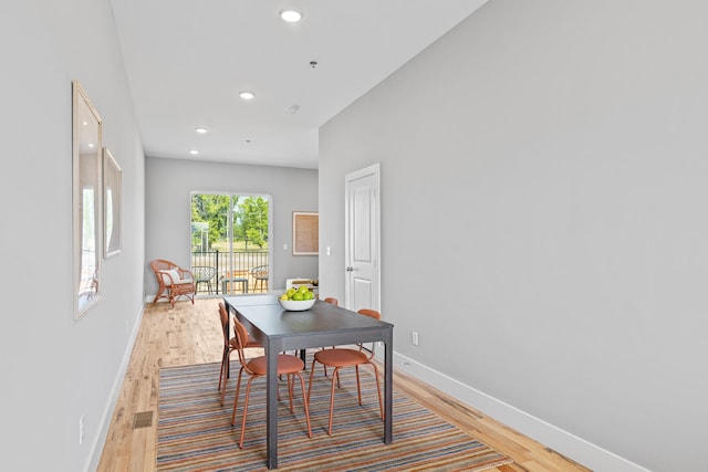 dining room with light wood-type flooring