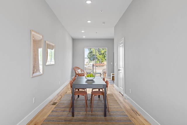 dining room with hardwood / wood-style floors