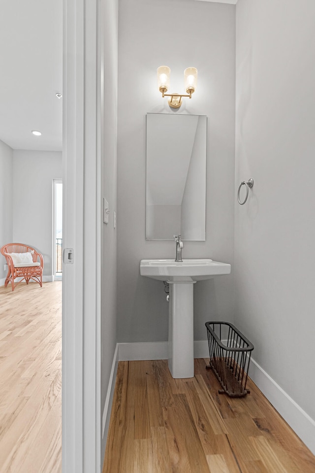 bathroom featuring hardwood / wood-style flooring