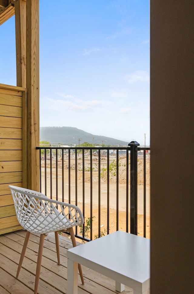 balcony featuring a mountain view