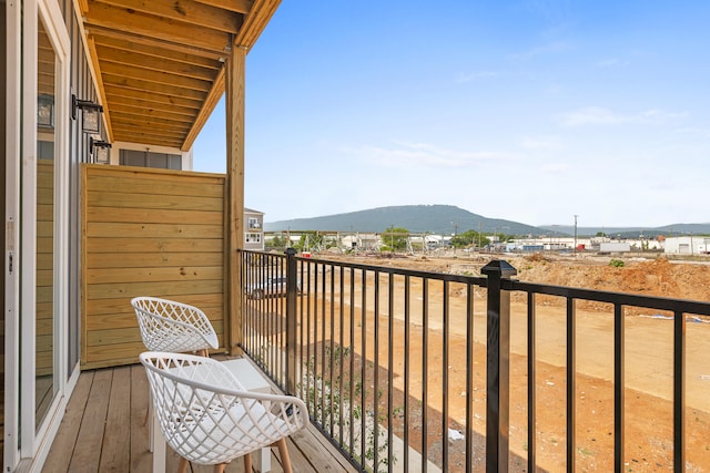 balcony featuring a mountain view