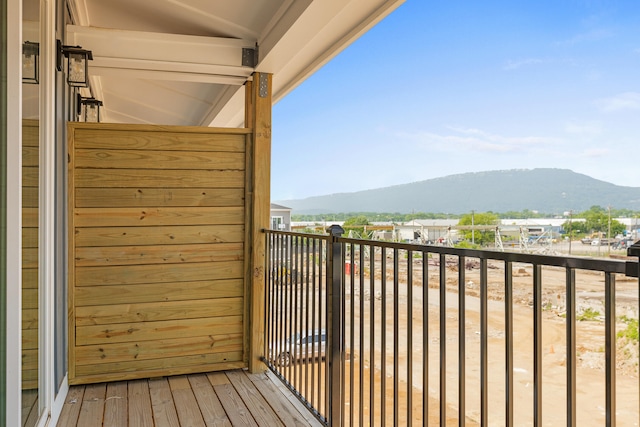 balcony featuring a mountain view