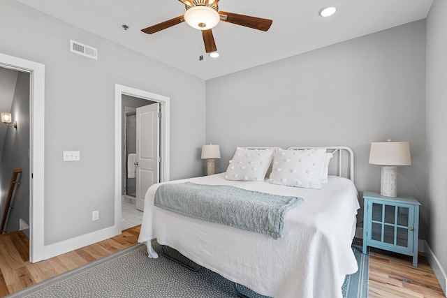 bedroom featuring light hardwood / wood-style flooring and ceiling fan