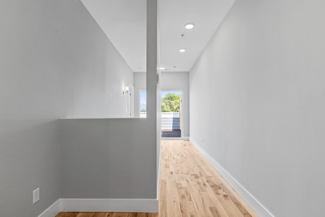 hall with light wood-type flooring