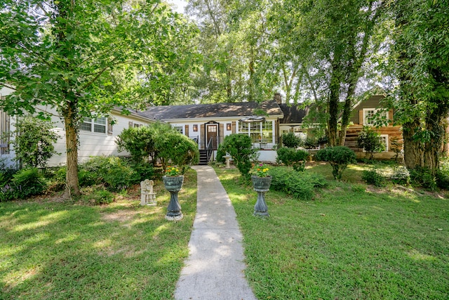 ranch-style house with a front yard