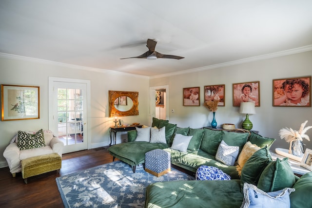 living room featuring crown molding, ceiling fan, and dark hardwood / wood-style floors