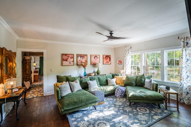 living room with crown molding, ceiling fan, and dark hardwood / wood-style floors