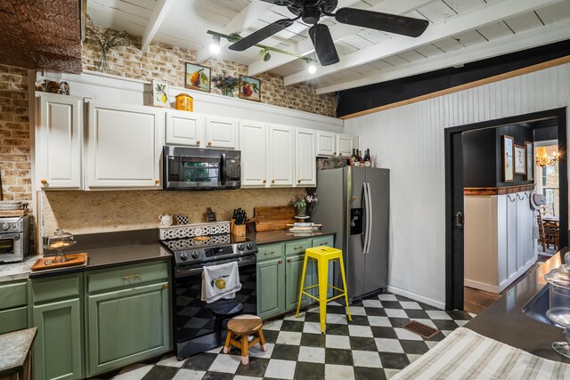 kitchen featuring brick wall, green cabinets, stainless steel appliances, and ceiling fan