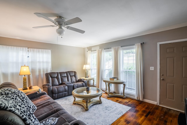 living room featuring ceiling fan, hardwood / wood-style flooring, and ornamental molding