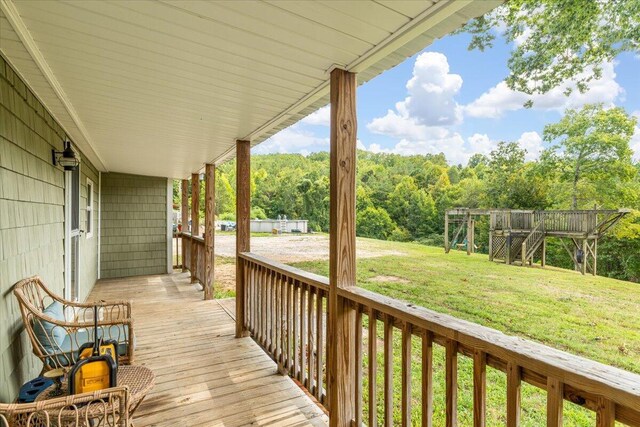 deck featuring a yard