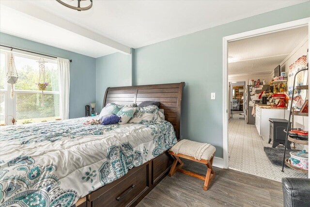 bedroom featuring dark hardwood / wood-style floors