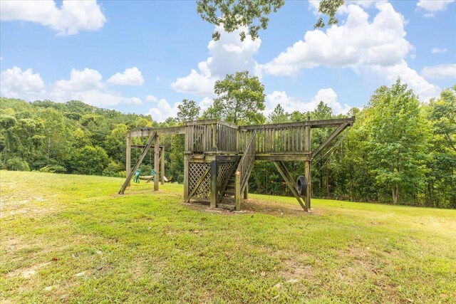 view of playground featuring a lawn