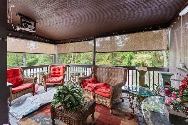 sunroom featuring a healthy amount of sunlight