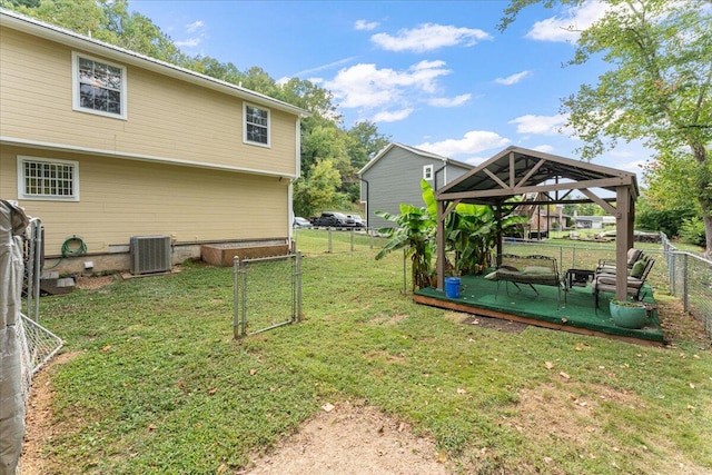 view of yard with cooling unit and a gazebo