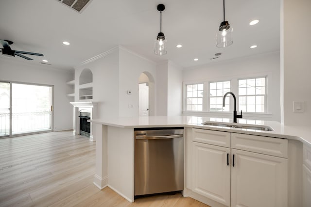 kitchen featuring dishwasher, sink, ceiling fan, light wood-type flooring, and white cabinets