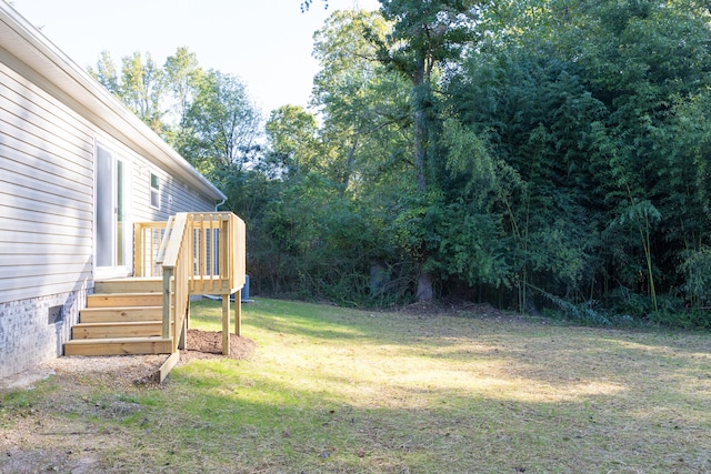 view of yard featuring a deck