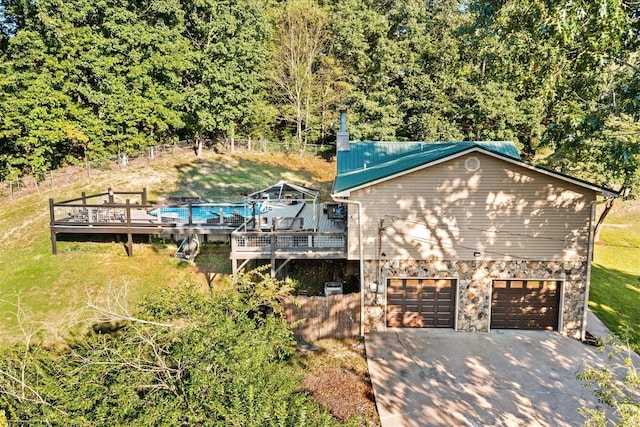 exterior space featuring a pool side deck