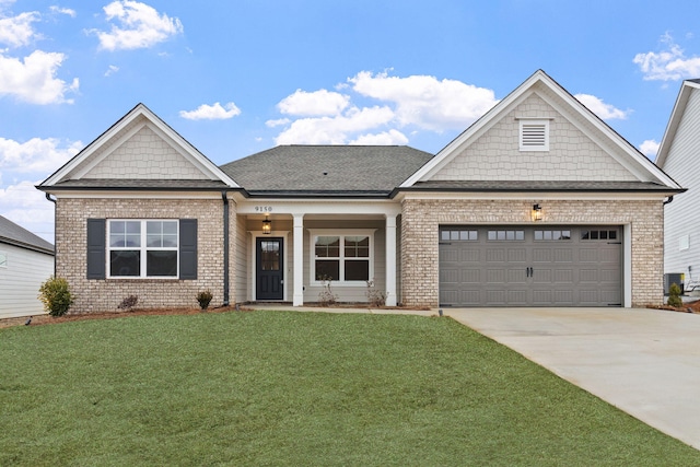 craftsman-style home with a front yard, central AC unit, and a garage