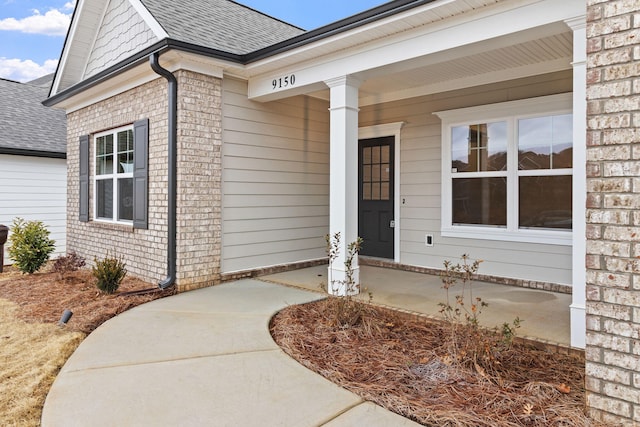 entrance to property with covered porch