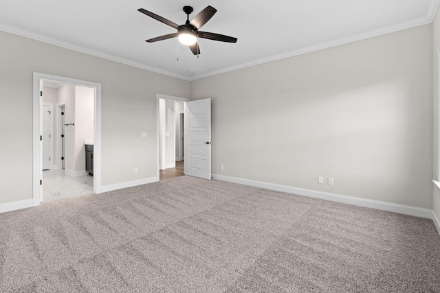 unfurnished bedroom with ceiling fan, light colored carpet, connected bathroom, and ornamental molding