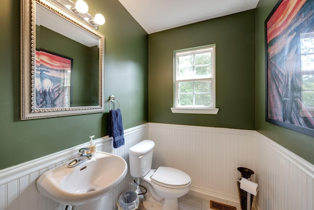 bathroom with toilet and sink