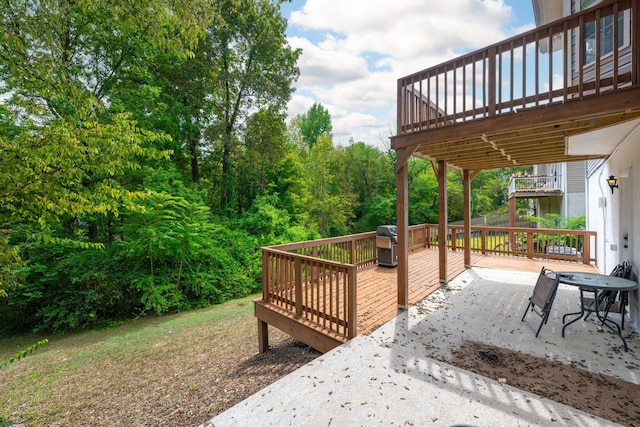 view of yard with a wooden deck