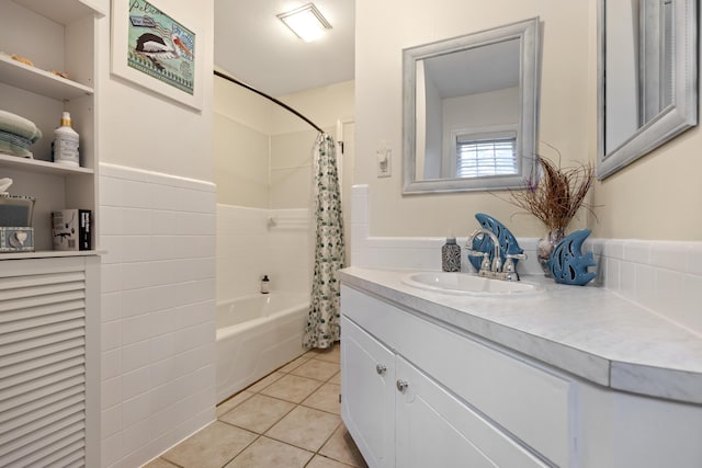 bathroom featuring vanity, tile patterned floors, and shower / tub combo with curtain