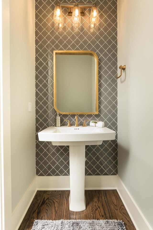 bathroom with wood-type flooring