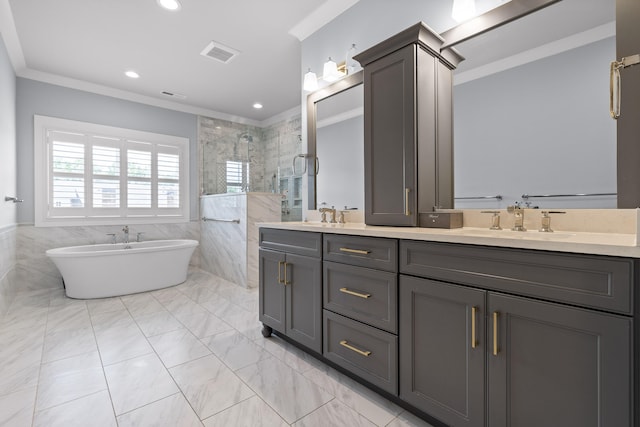 bathroom featuring vanity, ornamental molding, shower with separate bathtub, and tile walls