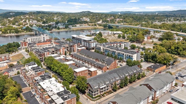 bird's eye view featuring a water and mountain view