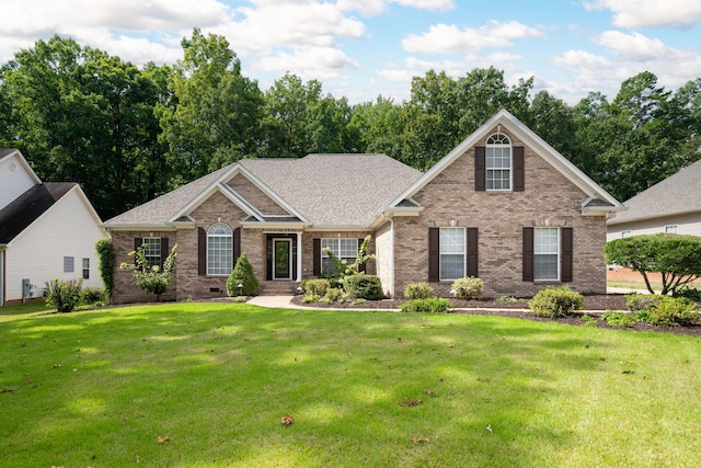 view of front facade with a front lawn