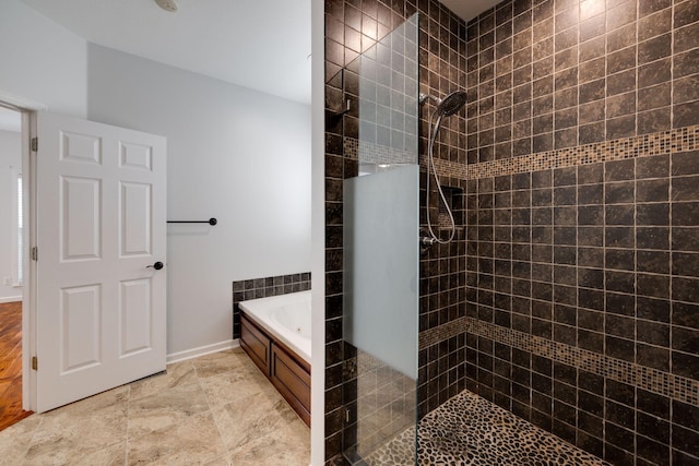 bathroom featuring plus walk in shower