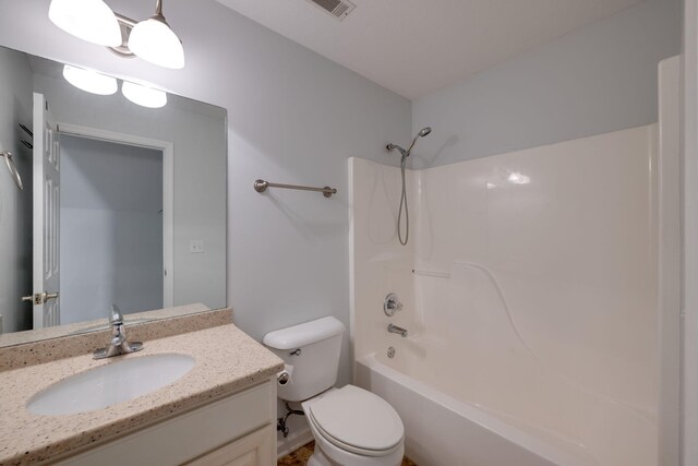 full bathroom with vanity, toilet, and shower / bathtub combination