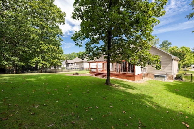 view of yard with a wooden deck