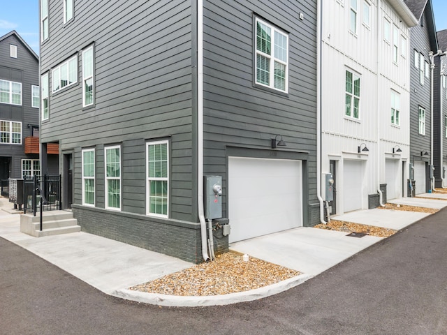 view of home's exterior with a garage