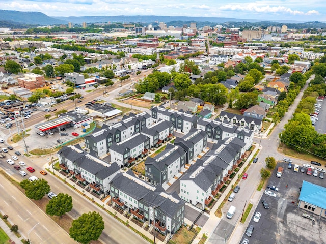 drone / aerial view featuring a mountain view