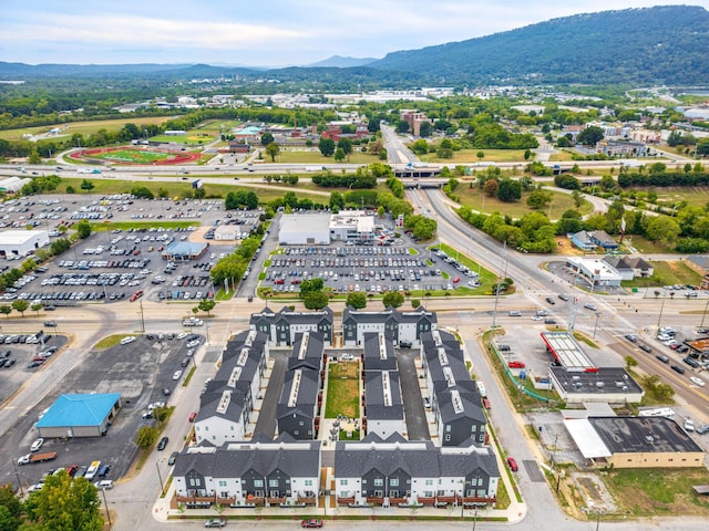 drone / aerial view featuring a mountain view