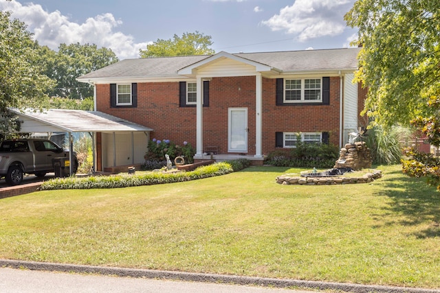 bi-level home featuring a front lawn and a carport