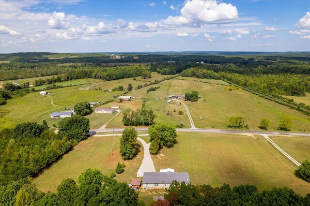 birds eye view of property featuring a rural view